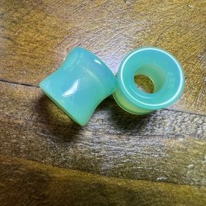 Green stone gauges body jewelry